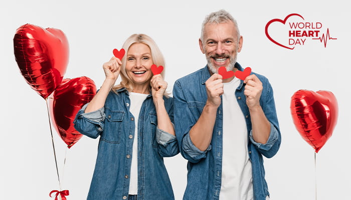 Man and woman celebrating World Heart Day