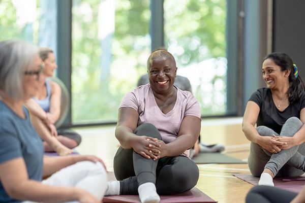 Candid moment of a group sitting after yoga